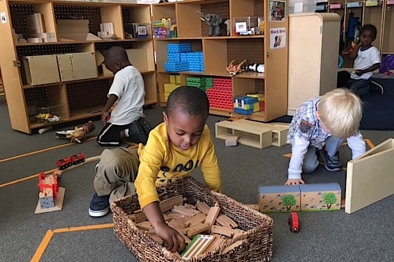 Children play in the “Bear Cubs” classroom at the Dahlia Campus preschool.