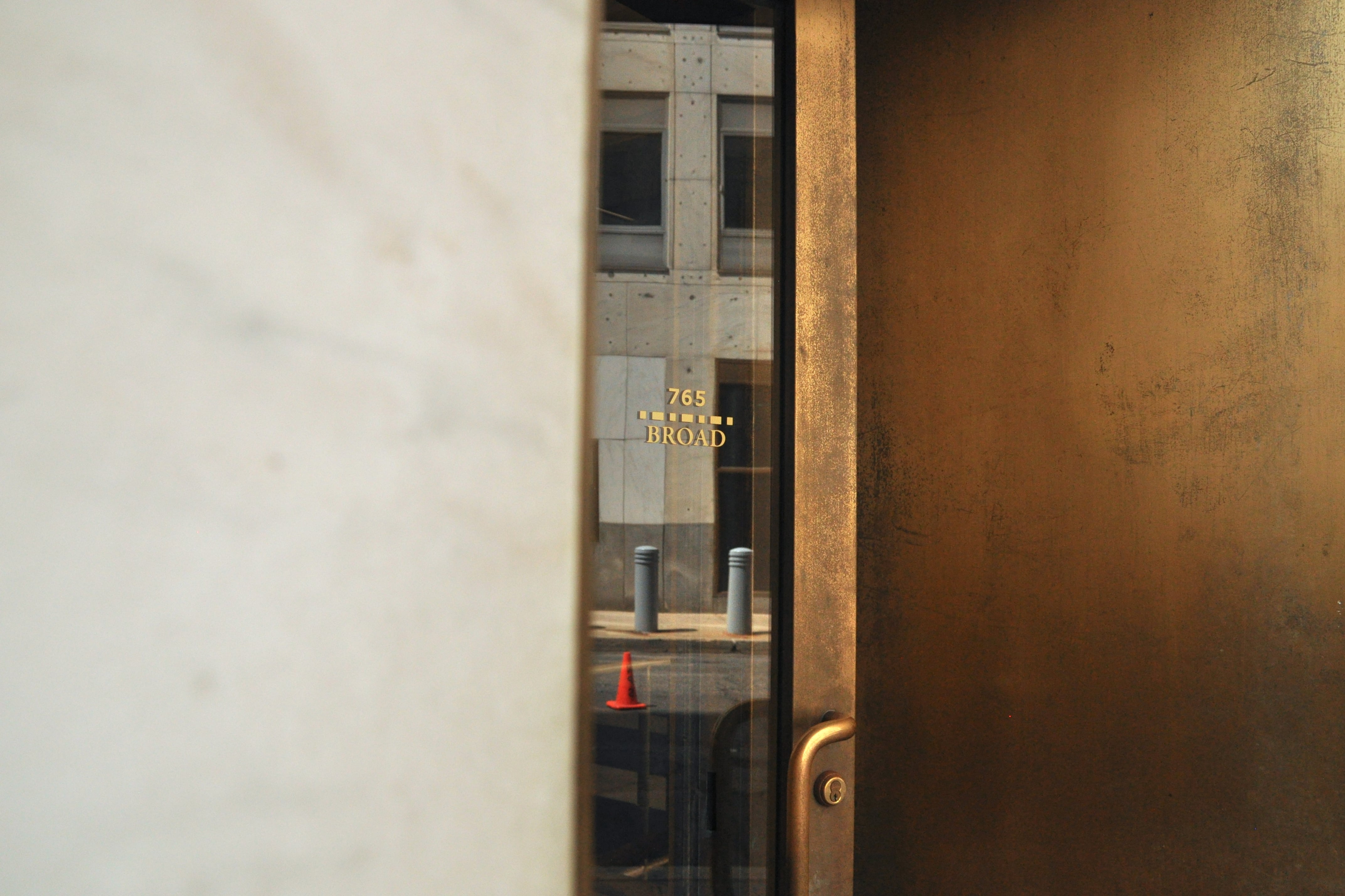 A photograph of an address on the side of a building.