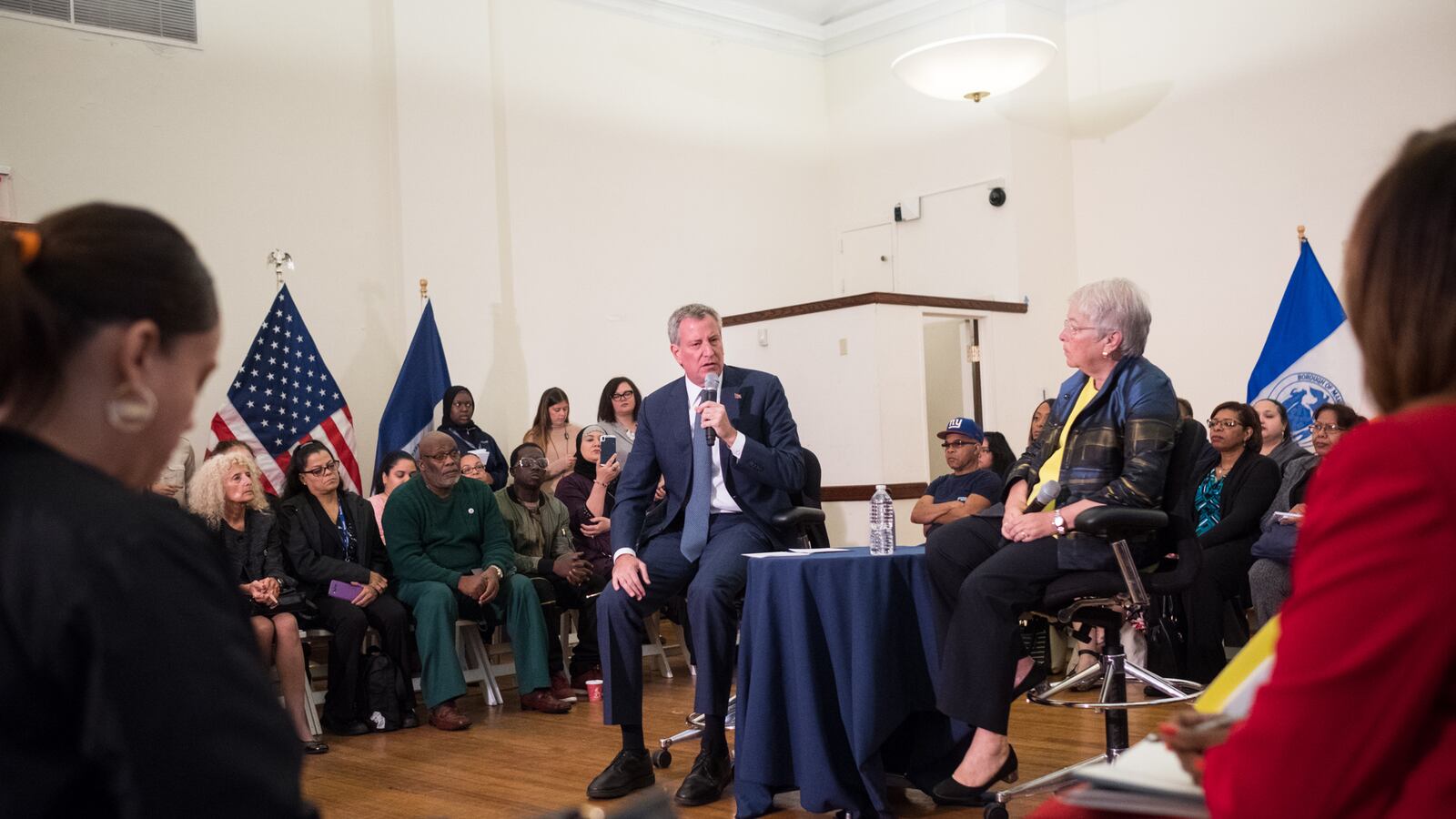 Mayor Bill de Blasio and Chancellor Carmen Fariña speak with parent leaders about school safety at the Harry Belafonte Library in October.