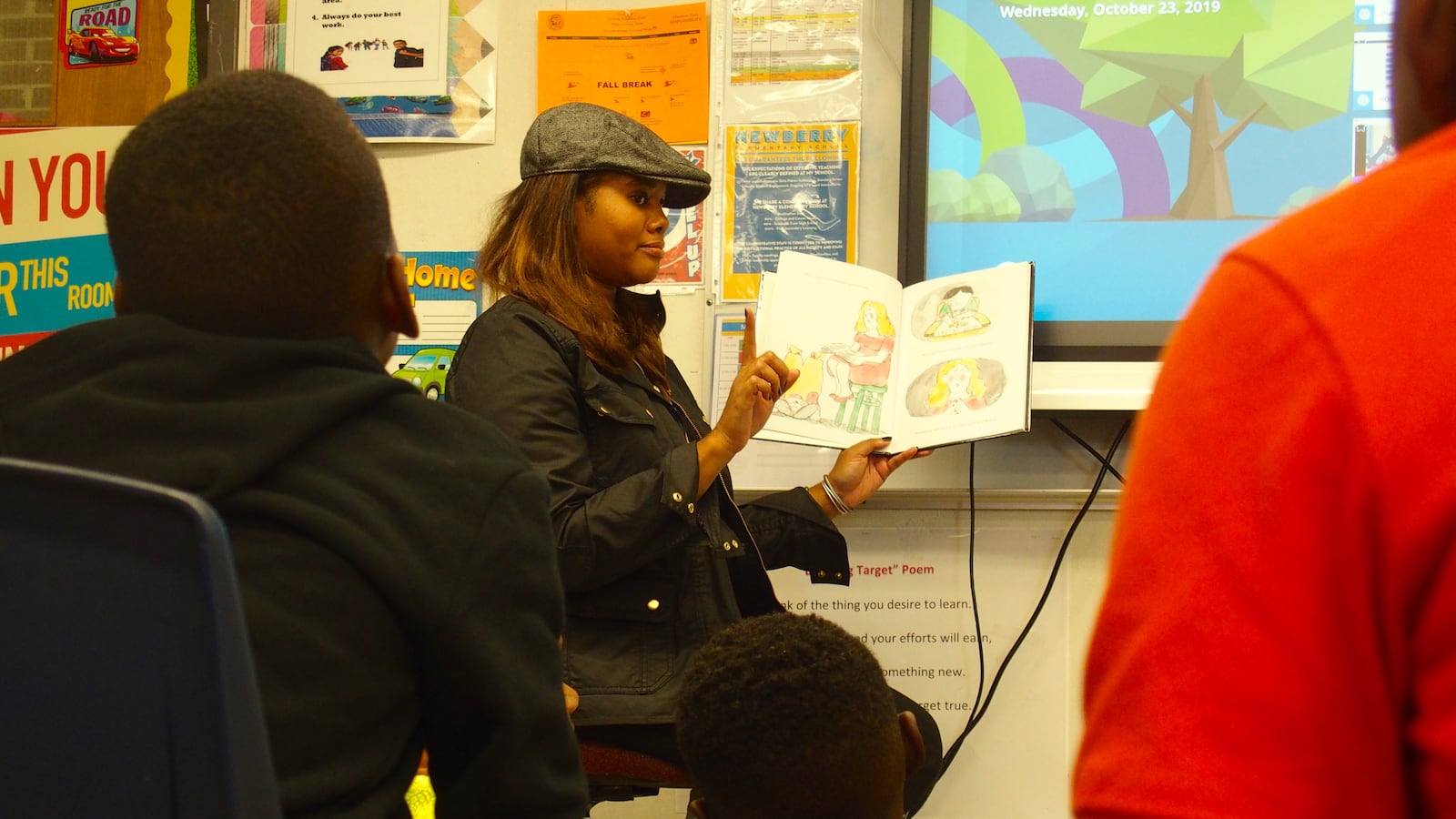 Shelby County school board chairwoman Miska Clay Bibbs reads to students at Newberry Elementary.