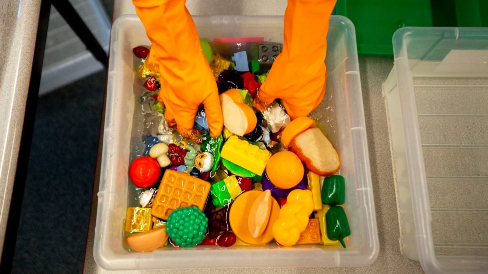 Saralyn Voltz bleaches toys in her preschool classroom at Denver’s Carson Elementary, March 13, 2020.