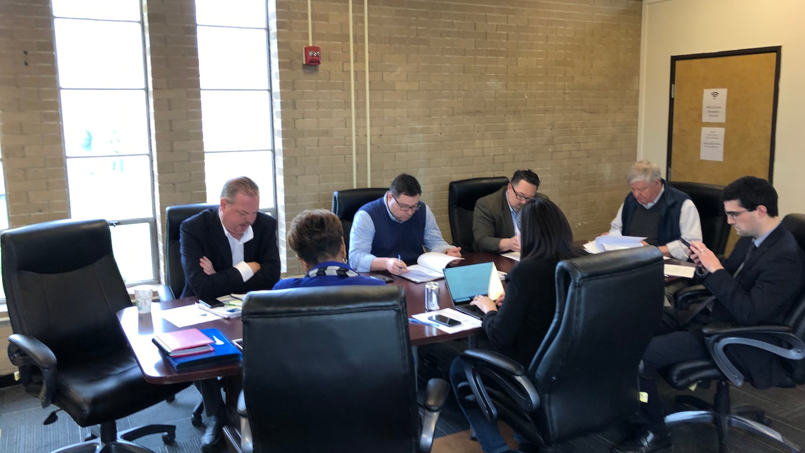A meeting of the board of Detroit Collegiate Academy, a charter school, on April 18. During the meeting, a social worker urged the board reconsider the expulsion of a student.