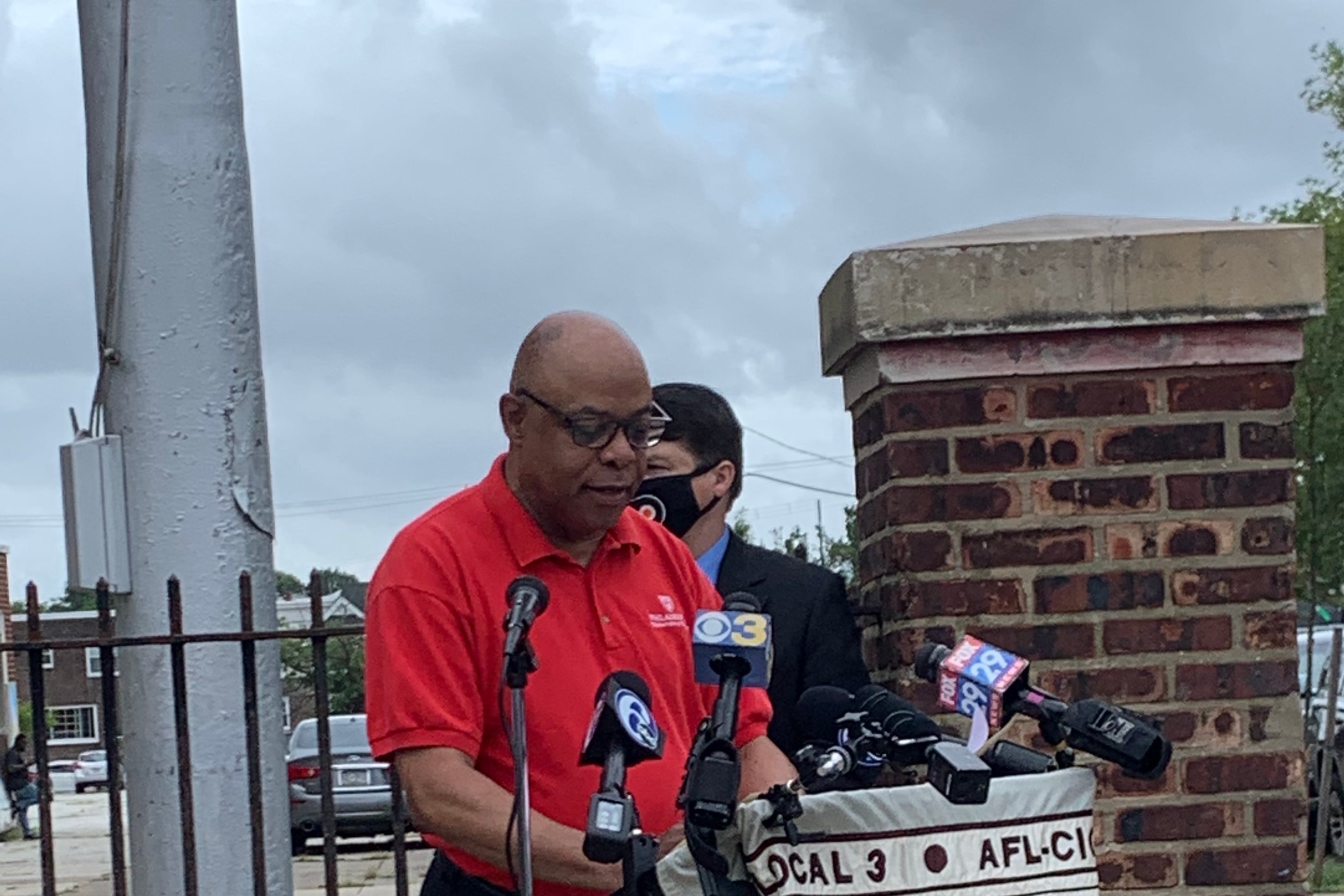 Jerry Jordan speaking at a podium.