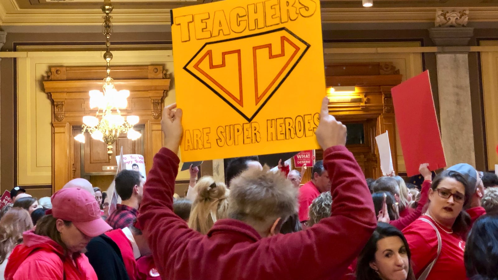 A sign raised in support of teachers at a rally held March 9, 2019 in the Statehouse.
