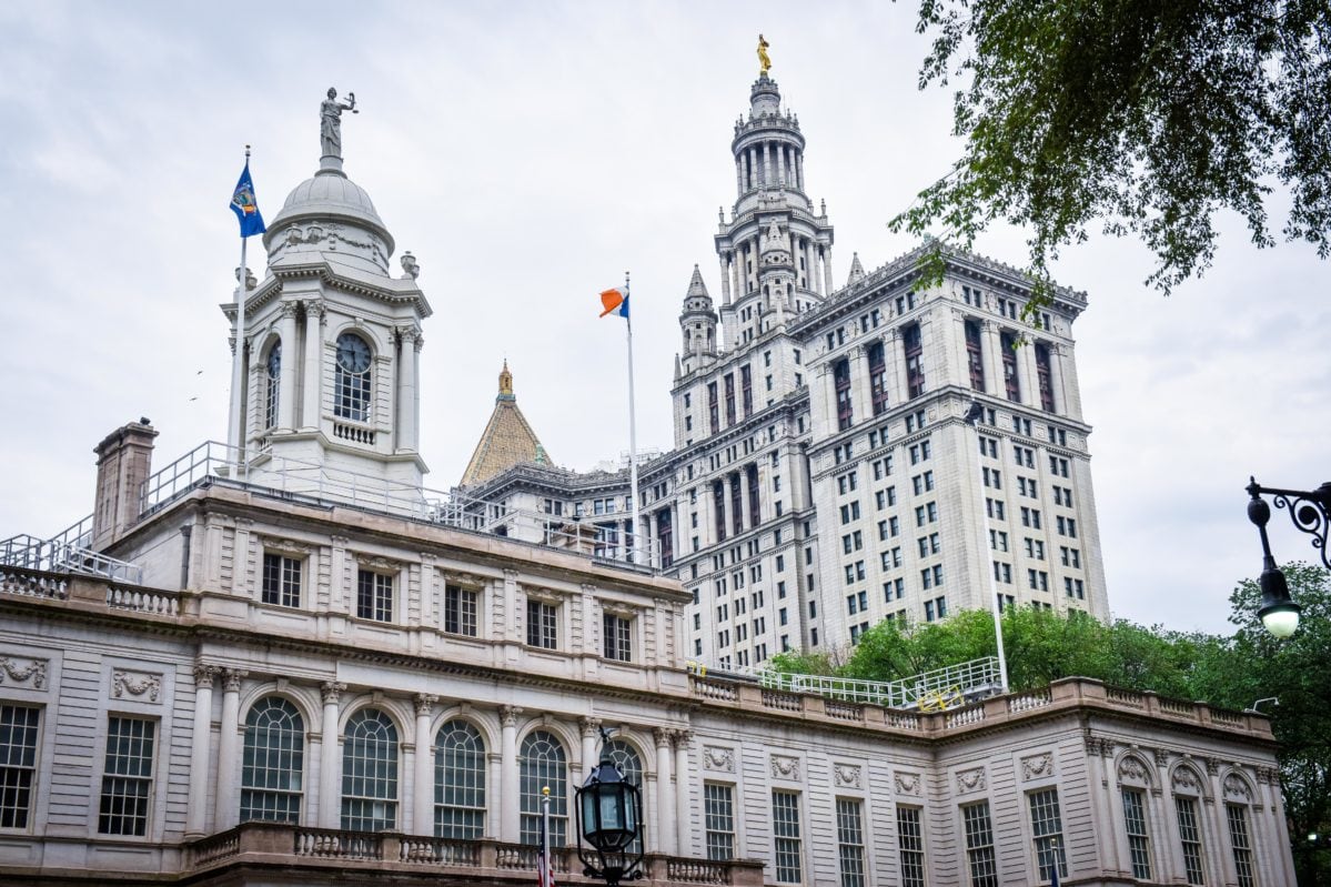 A large ornate white building seen from a distance