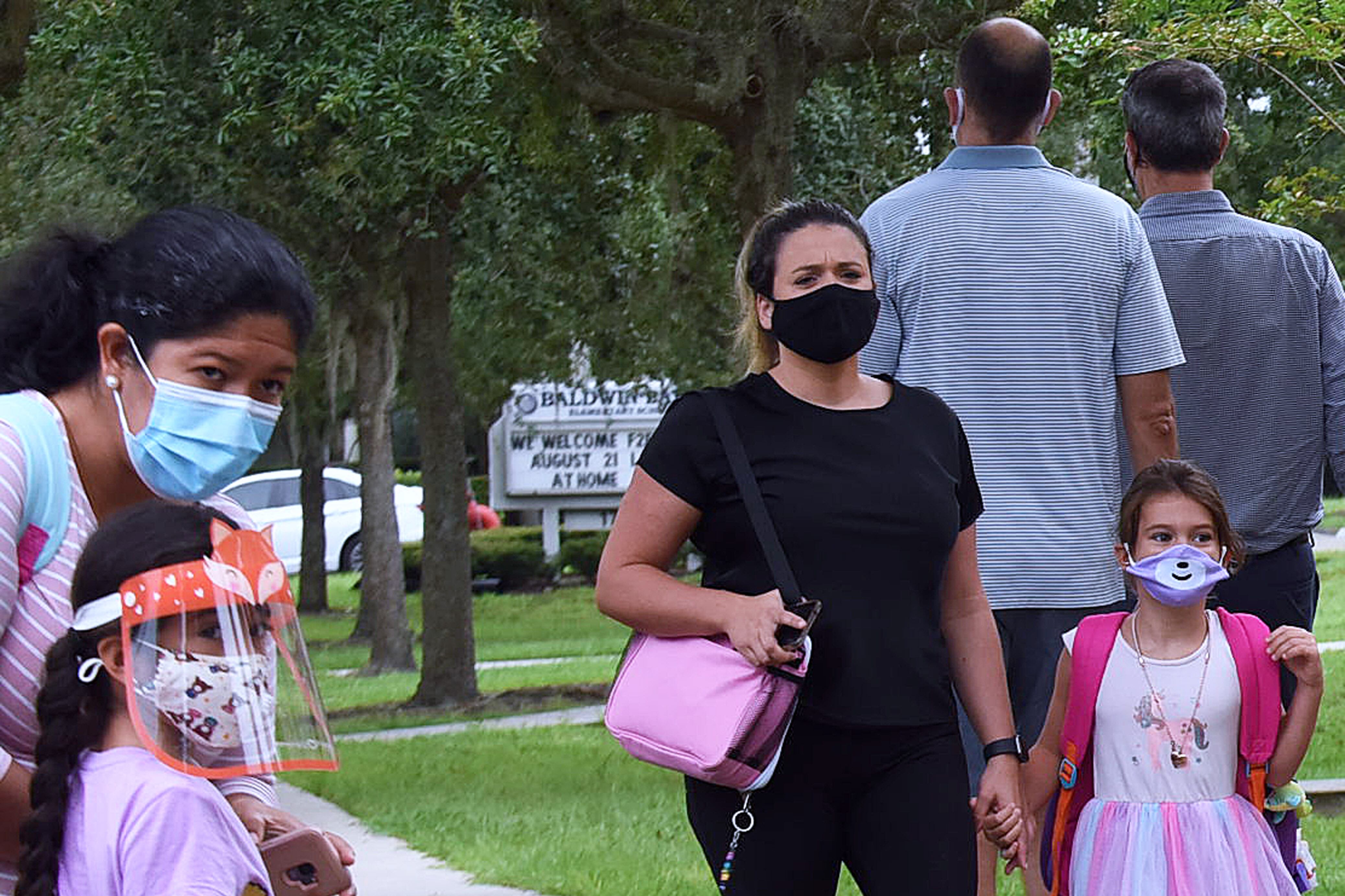 Students Return To Schools In Florida