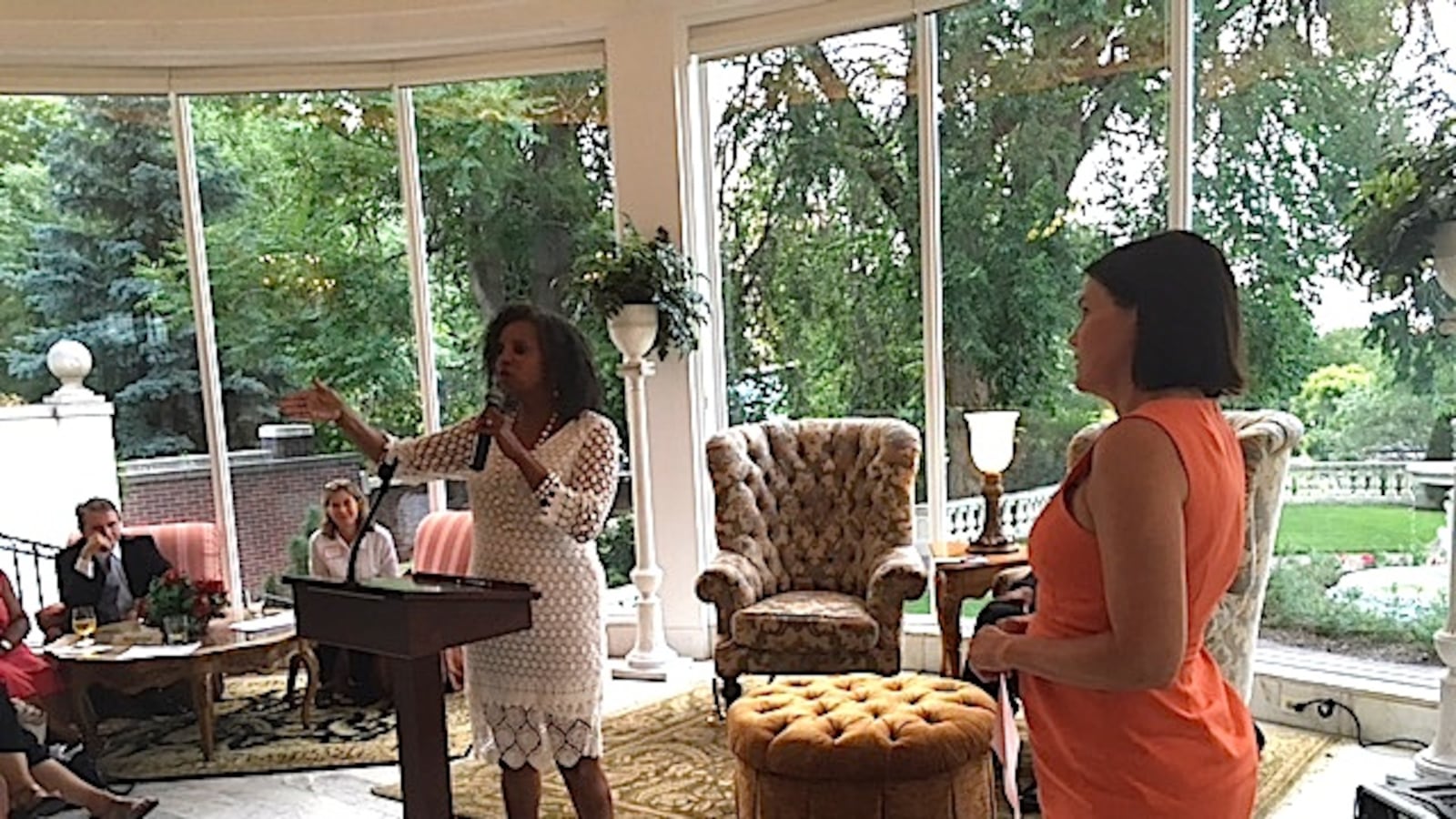 Metro State University professor Rosemarie Allen introduces state Rep. Susan Lontine at an event on preschool suspension and expulsion.