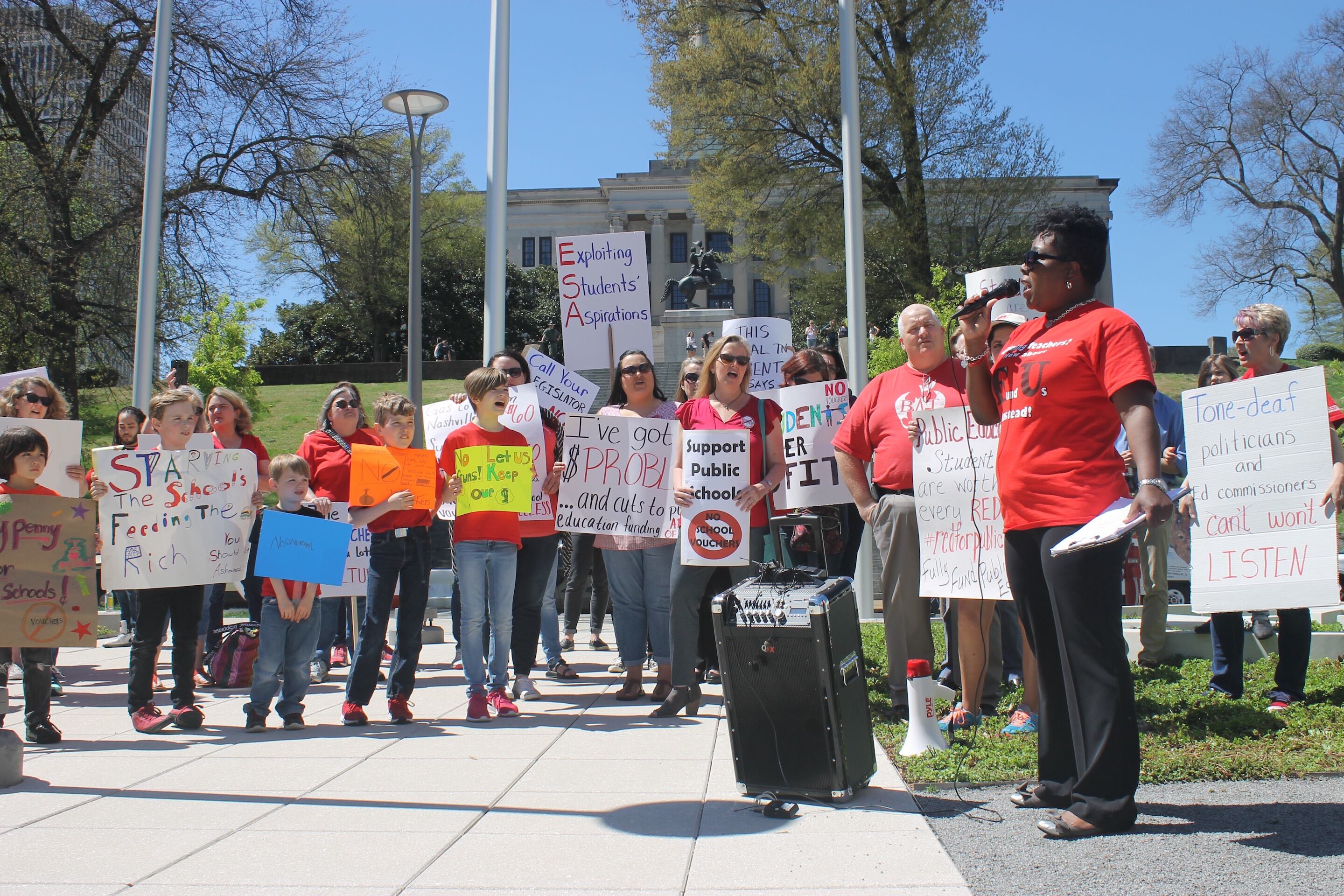Tikeila Rucker, president of the United Education Association of Shelby County, speaks during the anti-voucher rally.