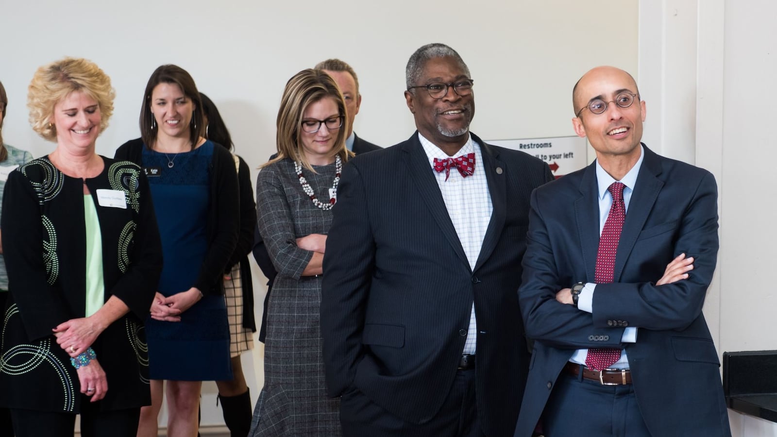 At SchoolSmart Kansas City's launch in April, Awais Sufi, right, stands next to Kansas City Mayor Sly James and Kaufman Foundation President Wendy Guillies (far left).