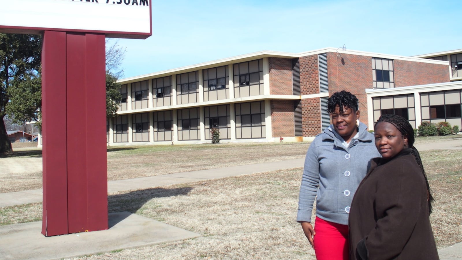 From left: Parents Charlotte Smith and Nadia Holmes stand in front of South Side Middle before the South Memphis school was shuttered in 2015. The decision by leaders of Shelby County Schools impacted 300 students.