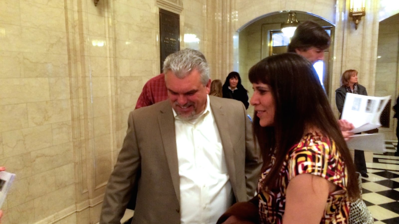 Sheridan Schools Superintendent Michael Clough, left, speaks with one of the district's board members, Sally Daigle before a State Board of Education hearing on the district's accreditation rating. The state board denied Sheridan's request to pump its rating. File photo