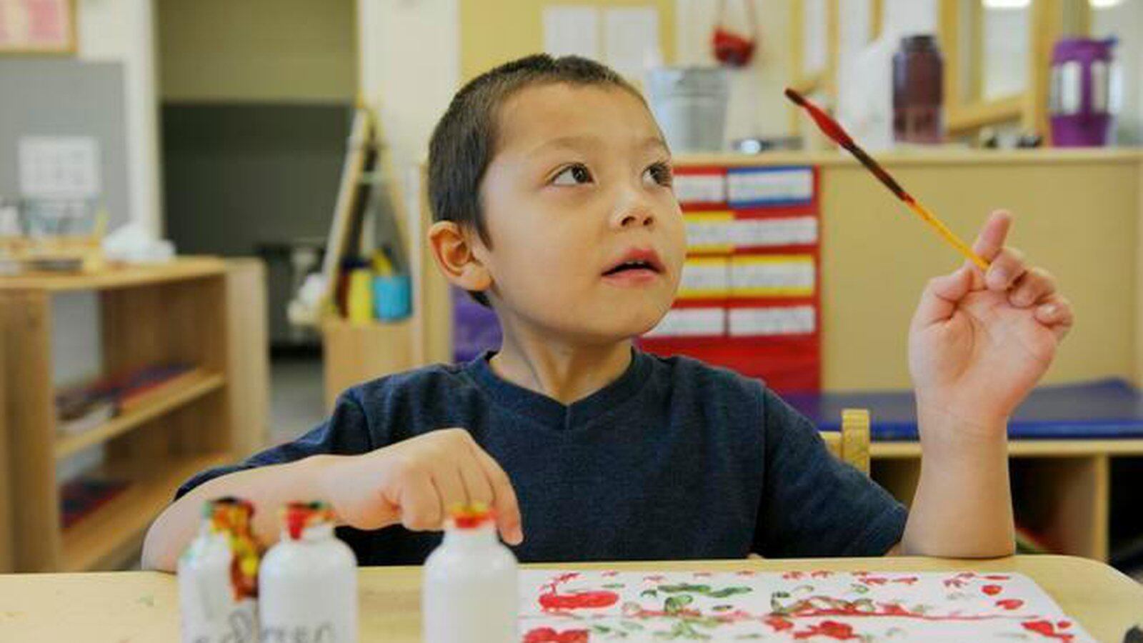 Josiah Berg, 4, paints a picture at Mile High Montessori, one of more than 250 Denver preschools that are part of the Denver Preschool Program.