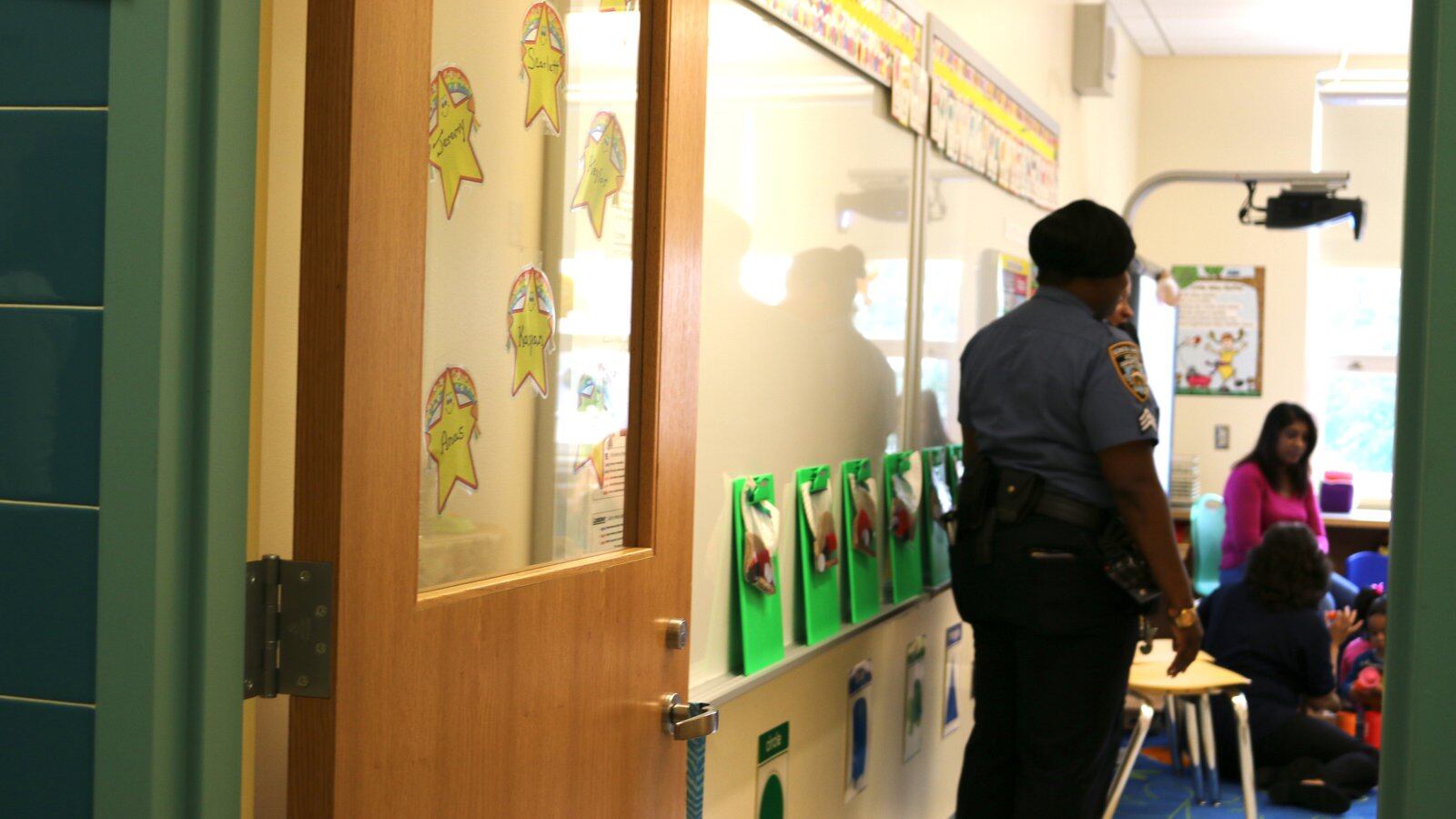 A member of the New York Police Department visits a classroom at Queens Explorers Elementary School.