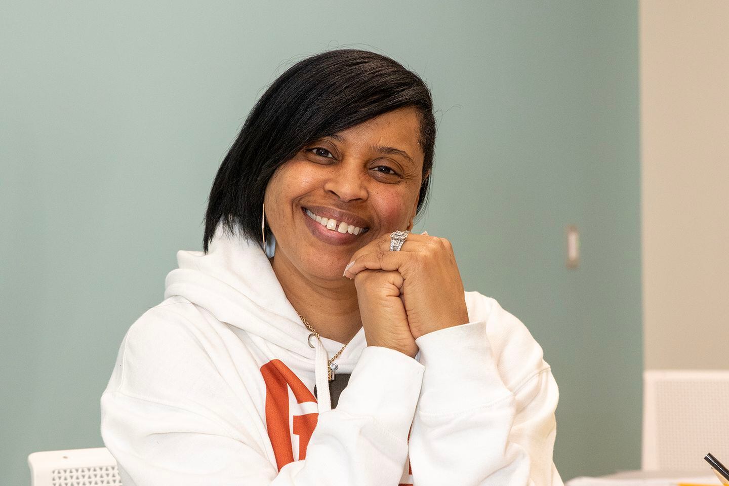 Clarice Williams, a reading specialist for Cincinnati Public Schools, tutors children staying at the city's main family shelter through Project Connect.