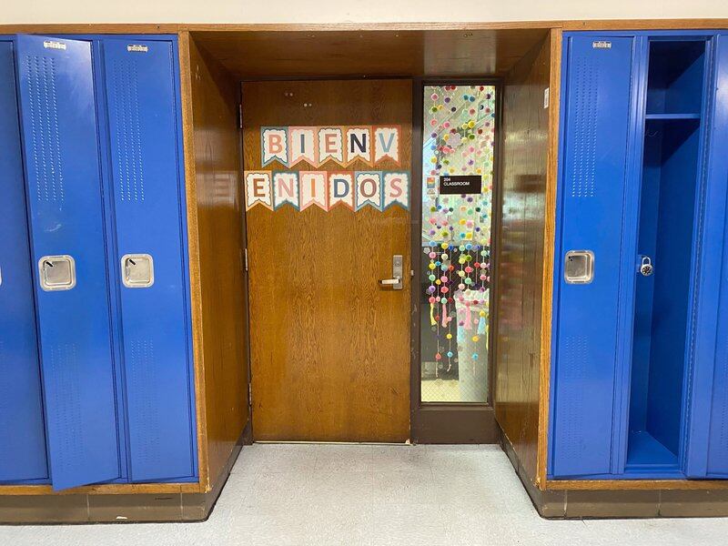 A classroom door welcomes students in Spanish at Kenwood Academy in Hyde Park.&nbsp;